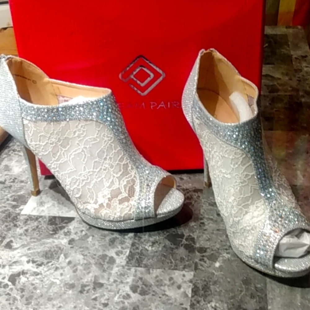White lace ankle boots with silver rhinestones. New, never worn.
